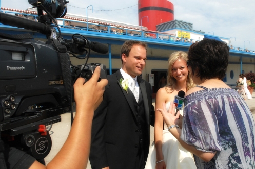 the happy couple in an impromptu tv interview by univision at north ave beach 